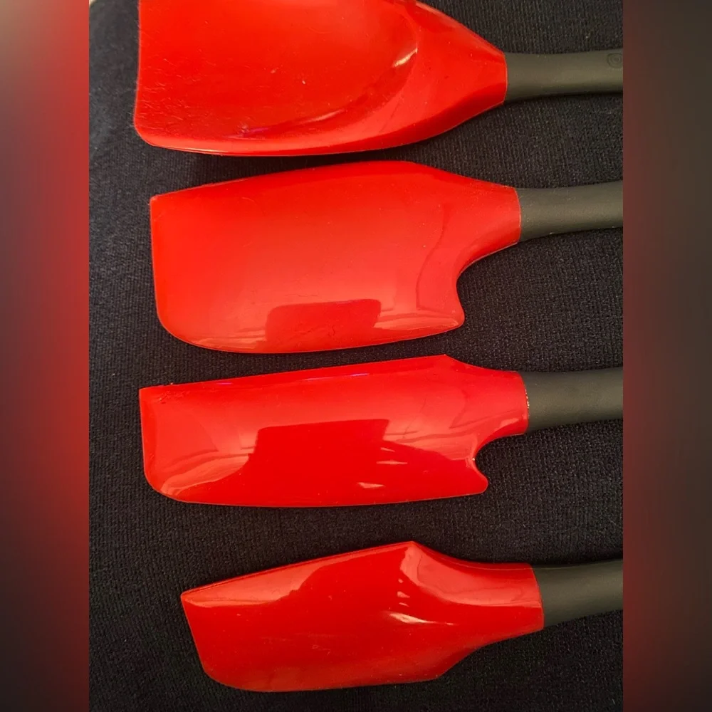 4 Le Creuset red utensils